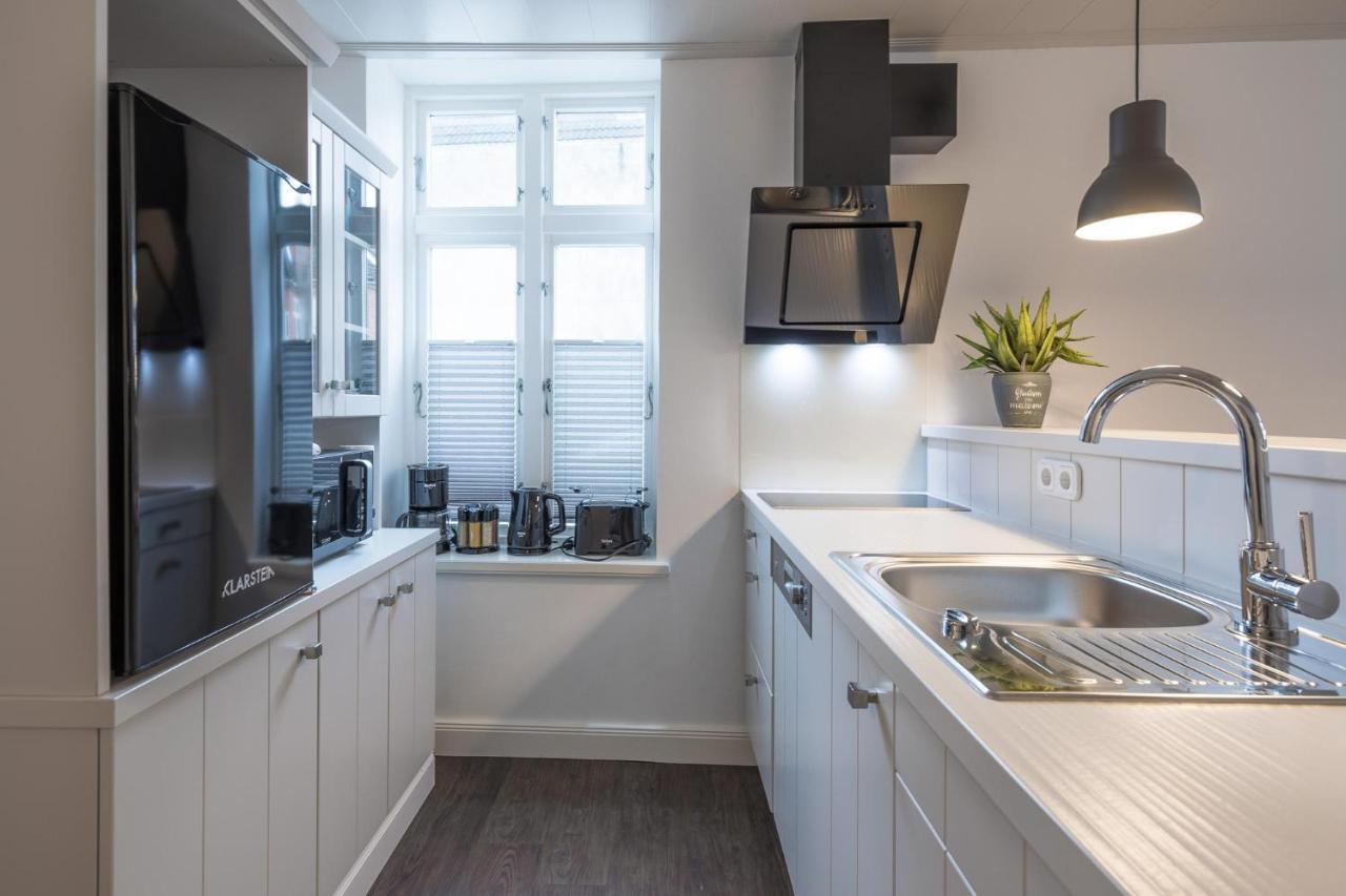 Apartmenthaus Theodor Storm Daemmerstunde ฮูซุม ภายนอก รูปภาพ