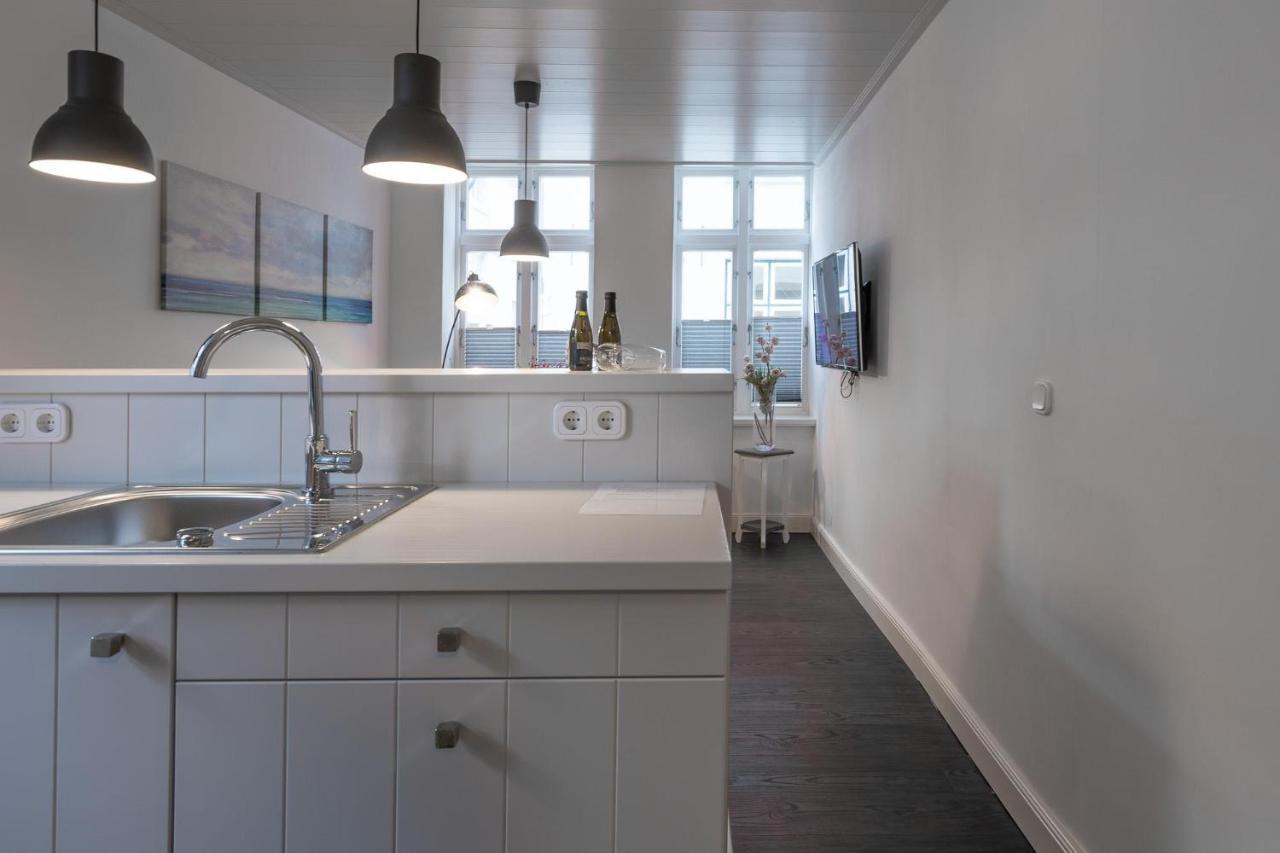 Apartmenthaus Theodor Storm Daemmerstunde ฮูซุม ภายนอก รูปภาพ